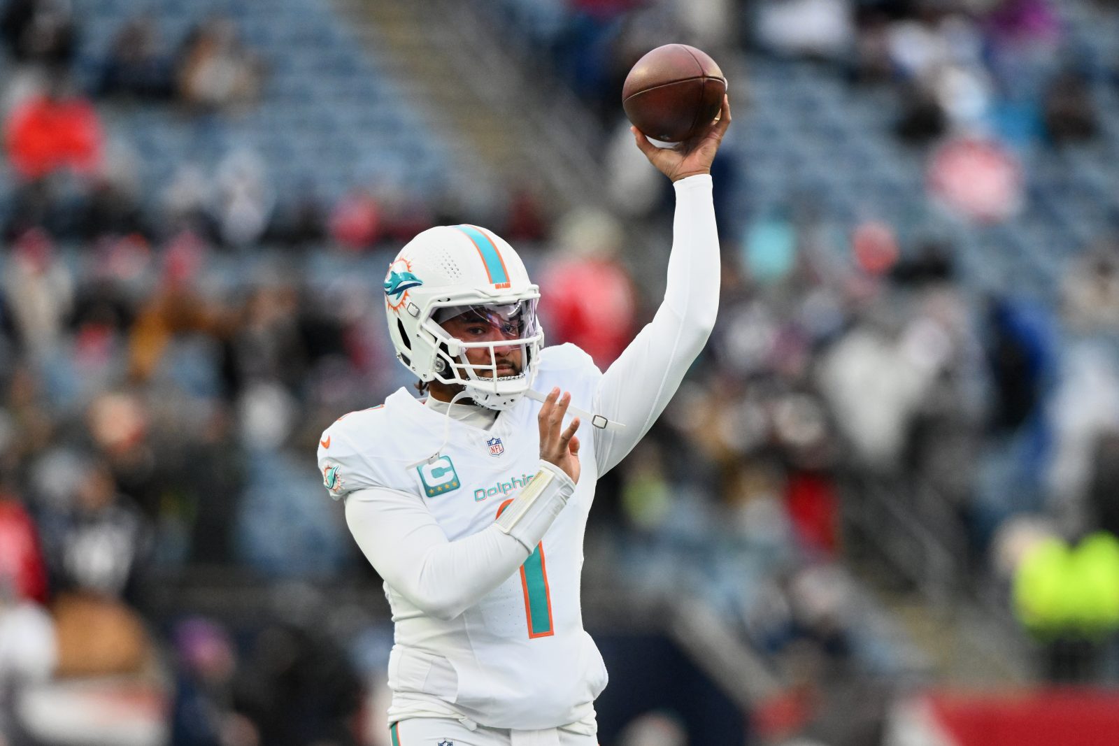 Jan 4, 2026; Foxborough, Massachusetts, USA; Miami Dolphins quarterback Tua Tagovailoa (1) throws a pass before the game against the New England Patriots at Gillette Stadium. Mandatory Credit: Brian Fluharty-Imagn Images