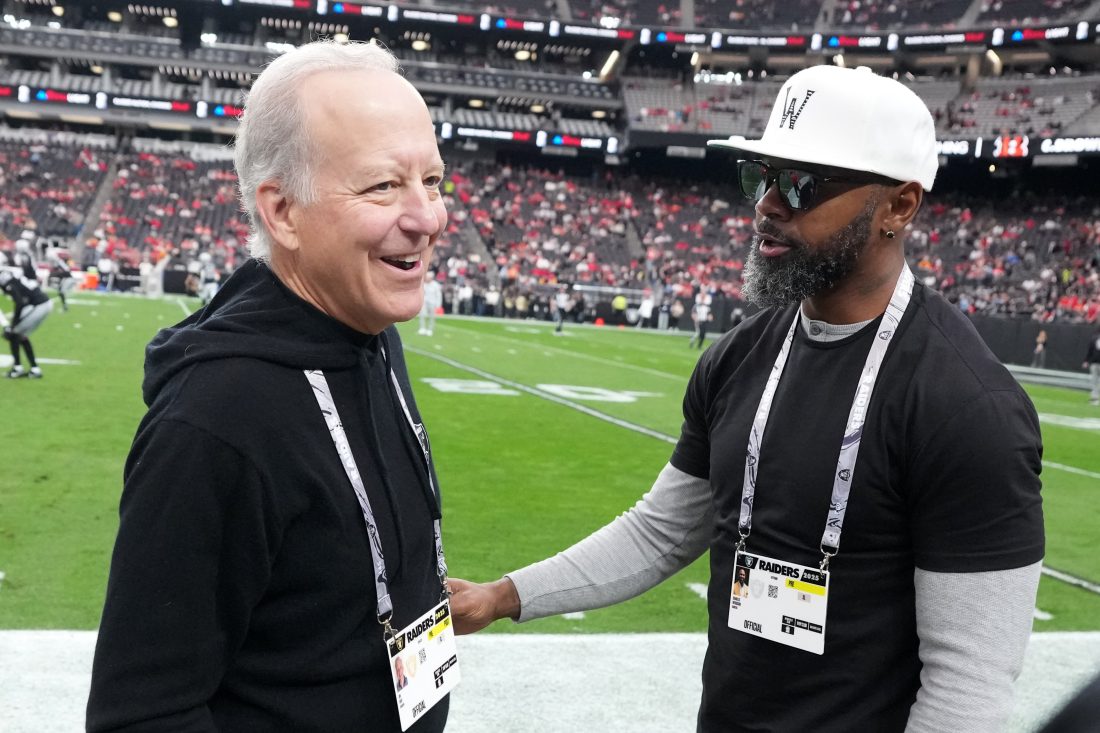 Jan 4, 2026; Paradise, Nevada, USA; Jim Gray (left) and Charles Woodson attend the game between the Las Vegas Raiders and the Kansas City Chiefs at Allegiant Stadium. Mandatory Credit: Kirby Lee-Imagn Images