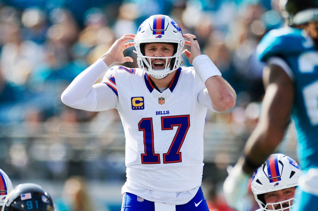 Buffalo Bills quarterback Josh Allen (17) calls a play during the first quarter of an NFL football AFC Wild Card playoff matchup, Sunday, Jan. 11, 2026, in Jacksonville, Fla. The Bills defeated the Jaguars 27-24.