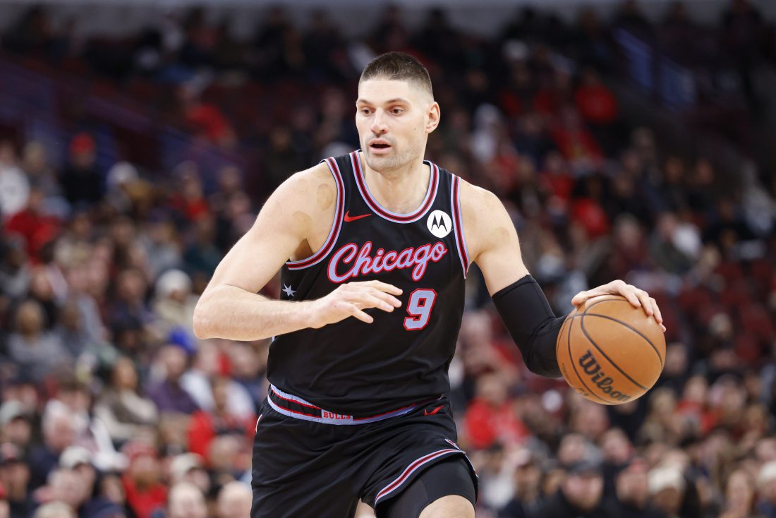 Jan 14, 2026; Chicago, Illinois, USA; Chicago Bulls center Nikola Vucevic (9) drives to the basket against the Utah Jazz during the second half at United Center. Mandatory Credit: Kamil Krzaczynski-Imagn Images