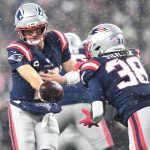 Jan 18, 2026; Foxborough, MA, USA; New England Patriots quarterback Drake Maye (10) hands off the ball in the third quarter against the Houston Texans in an AFC Divisional Round game at Gillette Stadium. Mandatory Credit: Brian Fluharty-Imagn Images