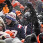 Jan 25, 2026; Denver, CO, USA; New England Patriots fans react during the second half in the 2026 AFC Championship Game at Empower Field at Mile High. Mandatory Credit: Ron Chenoy-Imagn Images