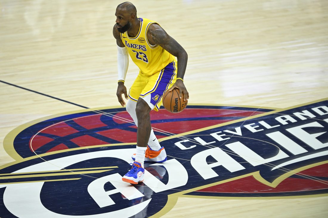 Jan 28, 2026; Cleveland, Ohio, USA; Los Angeles Lakers forward LeBron James (23) brings the ball up court in the fourth quarter against the Cleveland Cavaliers at Rocket Arena. Mandatory Credit: David Richard-Imagn Images