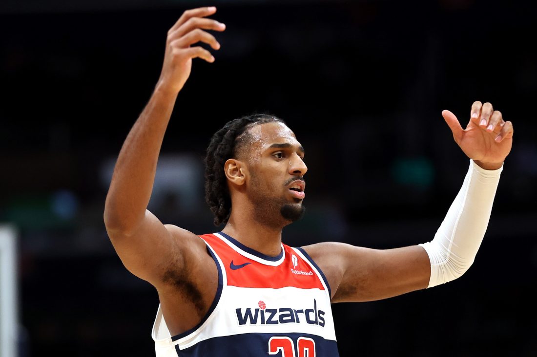 Jan 27, 2026; Washington, District of Columbia, USA; Washington Wizards center Alex Sarr (20) reacts to a call during the second half against the Portland Trail Blazers at Capital One Arena.