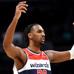 Jan 27, 2026; Washington, District of Columbia, USA; Washington Wizards center Alex Sarr (20) reacts to a call during the second half against the Portland Trail Blazers at Capital One Arena.