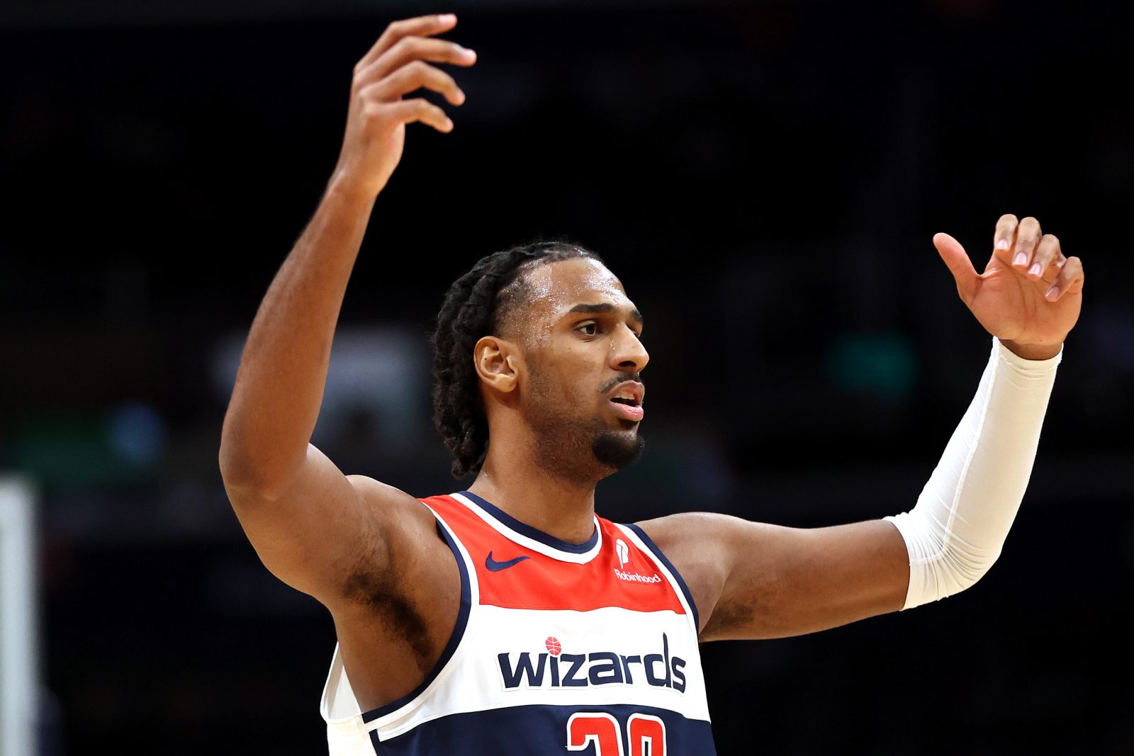Jan 27, 2026; Washington, District of Columbia, USA; Washington Wizards center Alex Sarr (20) reacts to a call during the second half against the Portland Trail Blazers at Capital One Arena.