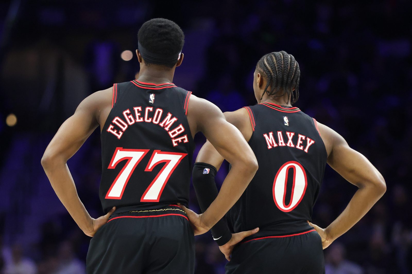 Jan 31, 2026; Philadelphia, Pennsylvania, USA; Philadelphia 76ers guard Tyrese Maxey (0) and guard Vj Edgecombe (77) look on against the New Orleans Pelicans during the second quarter at Xfinity Mobile Arena. Mandatory Credit: Bill Streicher-Imagn Images
