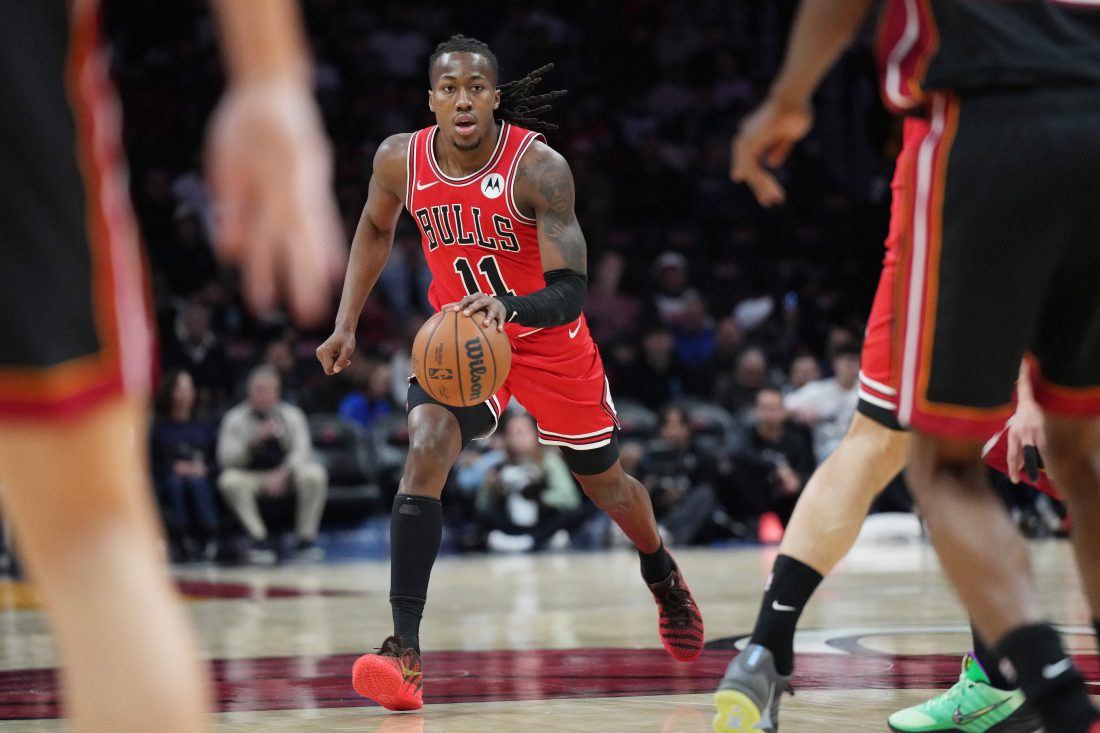 Feb 1, 2026; Miami, Florida, USA; Chicago Bulls guard Ayo Dosunmu (11) brings th ball up the court against the Miami Heat during the first half at Kaseya Center. Mandatory Credit: Jim Rassol-Imagn Images
