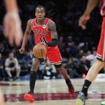 Feb 1, 2026; Miami, Florida, USA; Chicago Bulls guard Ayo Dosunmu (11) brings th ball up the court against the Miami Heat during the first half at Kaseya Center. Mandatory Credit: Jim Rassol-Imagn Images