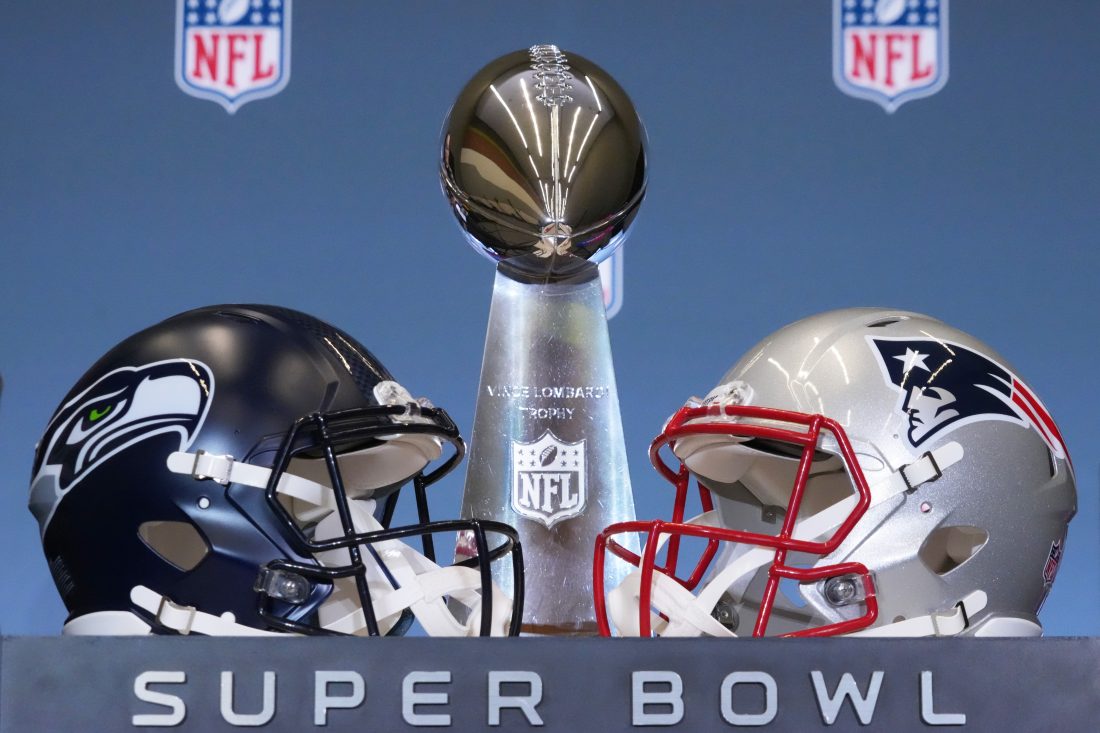 Feb 2, 2026; San Jose, CA, USA; The Seattle Seahawks and New England Patriots helmets are displayed with the Vince Lombardi Trophy before a press conference for NFL commissioner Roger Goodell at San Jose Convention Center. Mandatory Credit: Kirby Lee-Imagn Images