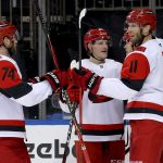 Feb 5, 2026; New York, New York, USA; Carolina Hurricanes center Jordan Staal (11) celebrates his empty net goal against the New York Rangers with teammates during the third period at Madison Square Garden.