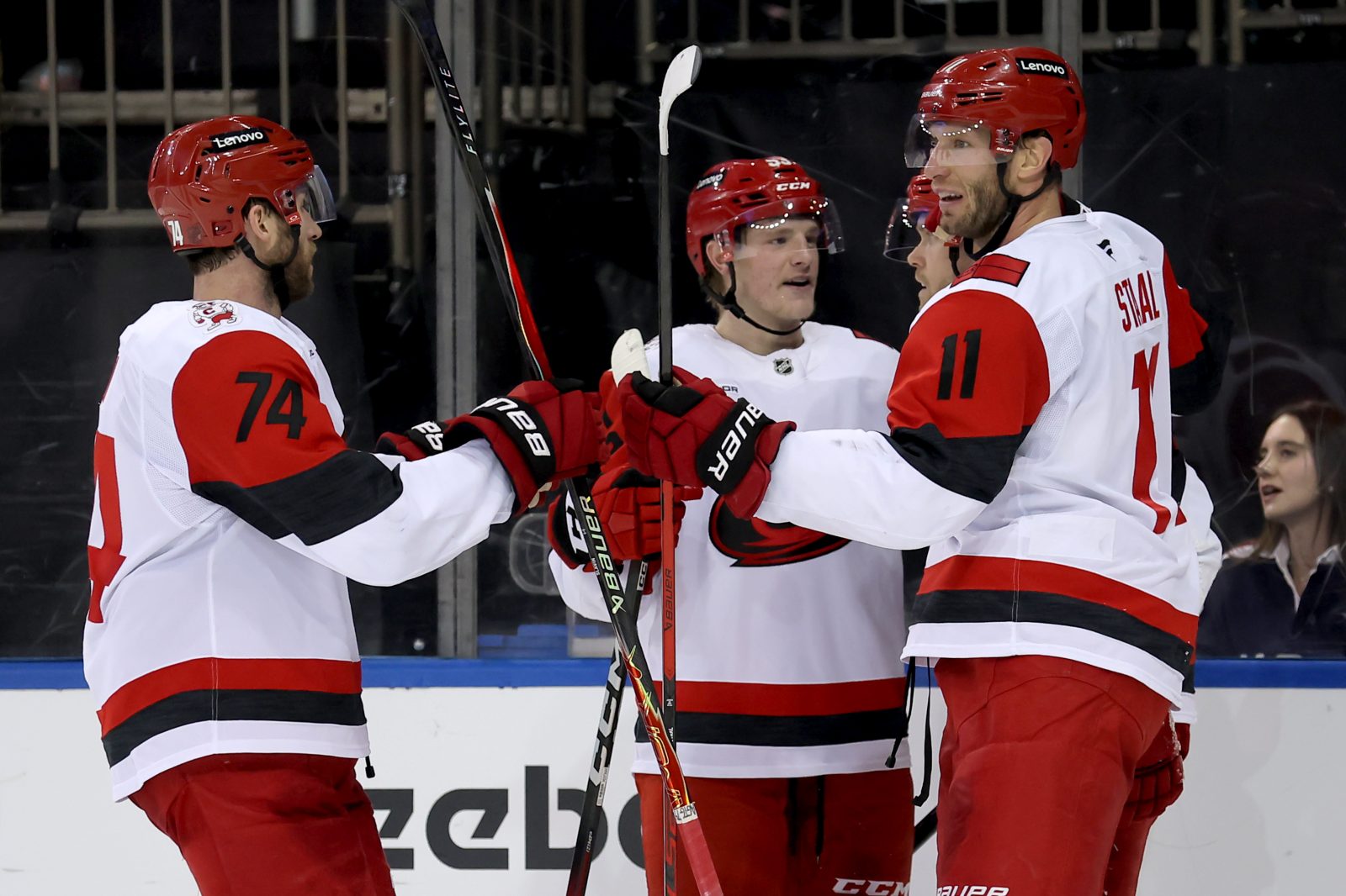 Feb 5, 2026; New York, New York, USA; Carolina Hurricanes center Jordan Staal (11) celebrates his empty net goal against the New York Rangers with teammates during the third period at Madison Square Garden.