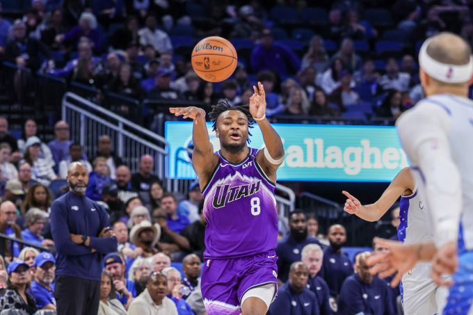 Feb 7, 2026; Orlando, Florida, USA; Utah Jazz guard Isaiah Collier (8) passes during the second half against the Orlando Magic at Kia Center. Mandatory Credit: Mike Watters-Imagn Images