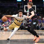 Feb 8, 2026; Washington, District of Columbia, USA; Washington Wizards guard Will Riley (27) attempts to dribble past Miami Heat guard Kasparas Jakucionis (25) Feb 8, 2026; Washington, District of Columbia, USA; during the fourth quarter at Capital One Arena. Mandatory Credit: