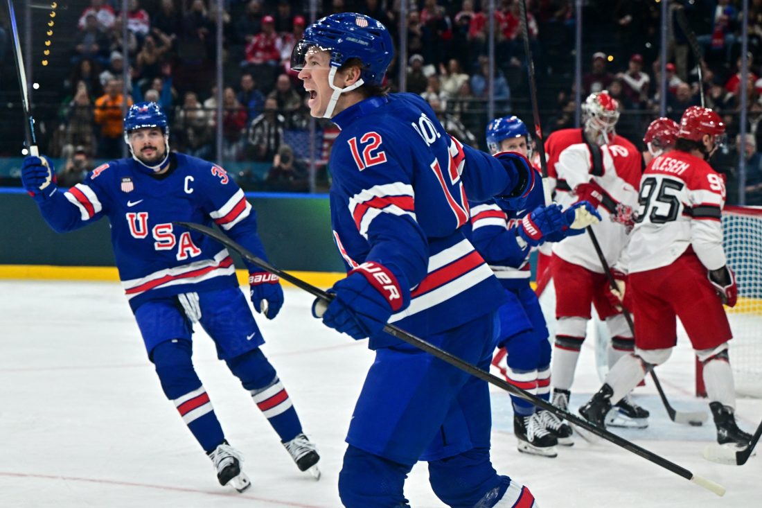 [US, Mexico & Canada customers only] Feb 14, 2026; Milan, Italy; Matt Boldy of United States celebrates scoring their first goal against Denmark in men's ice hockey group C play during the Milano Cortina 2026 Olympic Winter Games at Milano Santagiulia Ice Hockey Arena. Mandatory Credit: Marton Monus/Reuters via Imagn Images