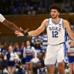 Feb 16, 2026; Durham, North Carolina, USA; Duke Blue Devils forward Cameron Boozer (12) celebrates with Duke Blue Devils center Patrick Ngongba II (21) during the during the second half against the Syracuse Orange at Cameron Indoor Stadium. Mandatory Credit: Zachary Taft-Imagn Images