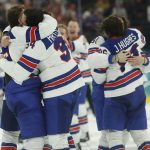 Feb 22, 2026; Milan, Italy; Team USA players celebrate after a golden goal in overtime by Jack Hughes #86 of Team United States during the Milano Cortina 2026 Olympic Winter Games at Milano Santagiulia Ice Hockey Arena. Mandatory Credit:
