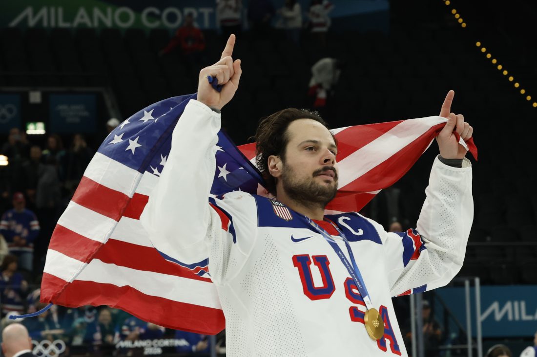 Feb 22, 2026; Milan, Italy; Auston Matthews #34 of Team United States celebrates after the game against Team Canada during the Milano Cortina 2026 Olympic Winter Games at Milano Santagiulia Ice Hockey Arena.