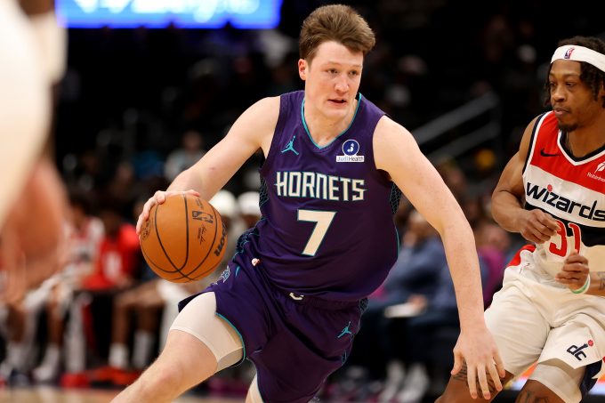 Feb 22, 2026; Washington, District of Columbia, USA; Charlotte Hornets guard Kon Knueppel (7) dribbles the ball during the second half against the Washington Wizards at Capital One Arena.