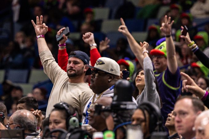 Feb 24, 2026; New Orleans, Louisiana, USA; New Orleans Pelicans fans react to a play against the Golden State Warriors during the first half at Smoothie King Center. Mandatory Credit: Stephen Lew-Imagn Images