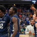 Mar 17, 2022; Indianapolis, IN, USA; Saint Peter's Peacocks forward Clarence Rupert (12) reacts after defeating the Kentucky Wildcats during the first round of the 2022 NCAA Tournament at Gainbridge Fieldhouse. Mandatory Credit: Robert Goddin-USA TODAY Sports