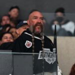 Mar 28, 2022; Los Angeles, California, USA; UFC and MMA referee Mike Beltran watches in the second period of the NHL game between the LA Kings and the Seattle Kraken at Crypto.com Arena. Mandatory Credit: Kirby Lee-USA TODAY Sports