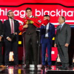 Jun 28, 2024; Las Vegas, Nevada, USA; Sacha Boisvert is selected by the Chicago Blackhawks with the 18th overall pick in the first round of the 2024 NHL Draft at The Sphere. Mandatory Credit: Stephen R. Sylvanie-USA TODAY Sports
