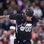 Feb 21, 2025; Salt Lake City, Utah, USA; Utah Jazz guard Jordan Clarkson (00) reacts to a shot against the Oklahoma City Thunder during the first quarter at Delta Center. Mandatory Credit: Rob Gray-Imagn Images