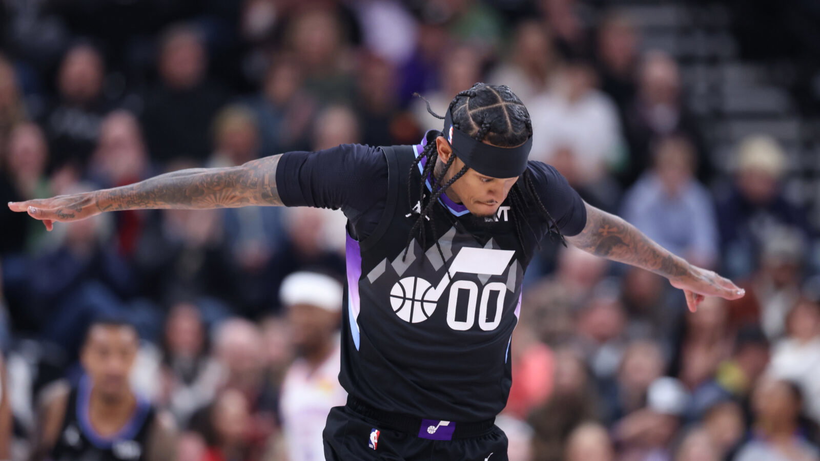 Feb 21, 2025; Salt Lake City, Utah, USA; Utah Jazz guard Jordan Clarkson (00) reacts to a shot against the Oklahoma City Thunder during the first quarter at Delta Center. Mandatory Credit: Rob Gray-Imagn Images