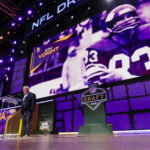 Apr 25, 2025; Green Bay, WI, USA; Former Minnesota Vikings tight end Stu Voigt announces the team’s selection with the 102nd overall pick during the third round of the 2025 NFL Draft at Lambeau Field. Mandatory Credit: Tork Mason/USA Today Network via Imagn Images