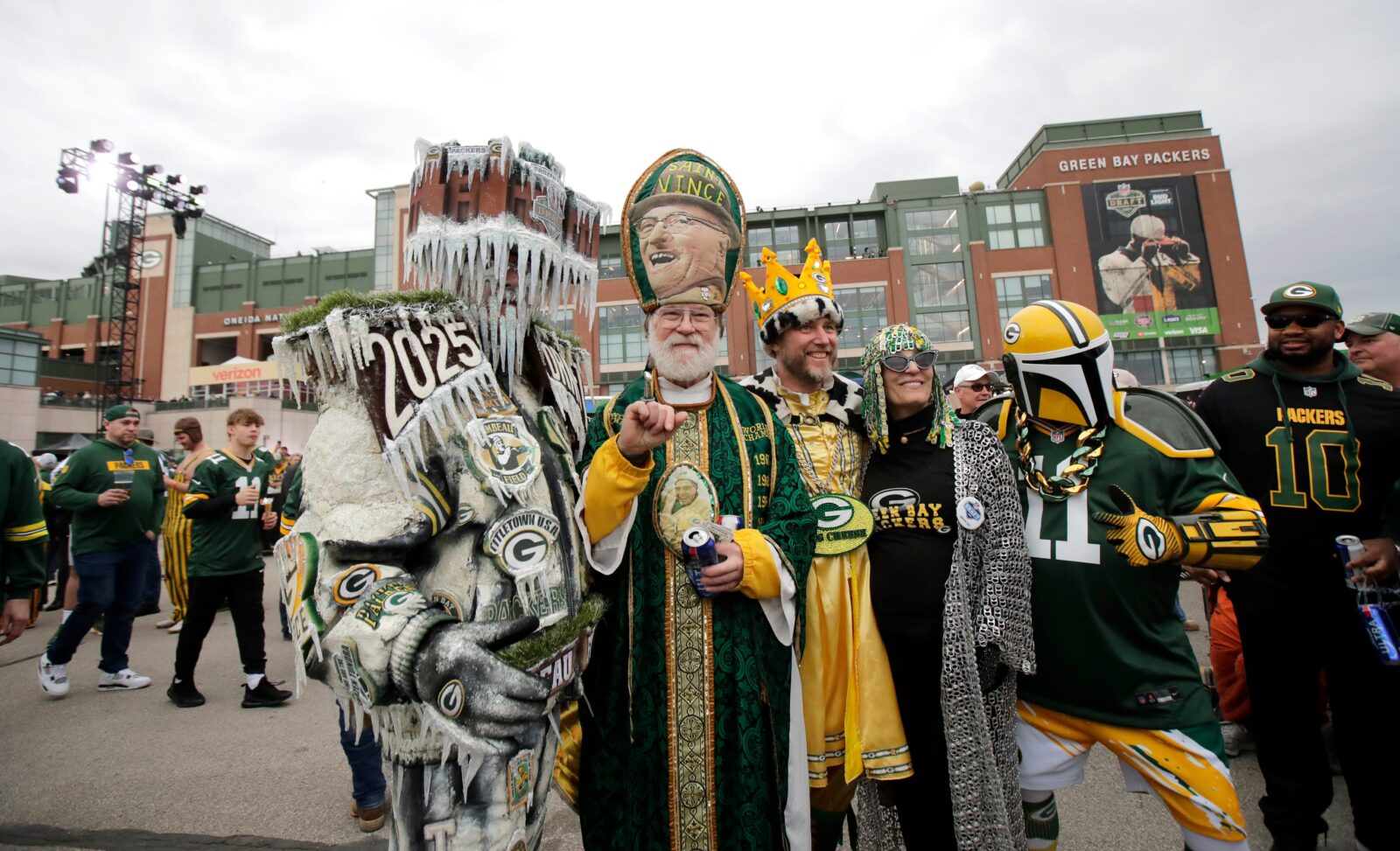 Green Bay Packers superfans gather for pictures with fans during the first day of the NFL Draft presented by Bud Light at the Draft Theater Thursday, April 24, 2025, outside of Lambeau Field in Green Bay, Wisconsin.