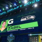 Apr 24, 2025; Green Bay, WI, USA; North Dakota State guard Grey Zabel is selected as the No. 18 pick by the Seattle Seahawks during the NFL Draft at Lambeau Field. Mandatory Credit: Kirby Lee-Imagn Images