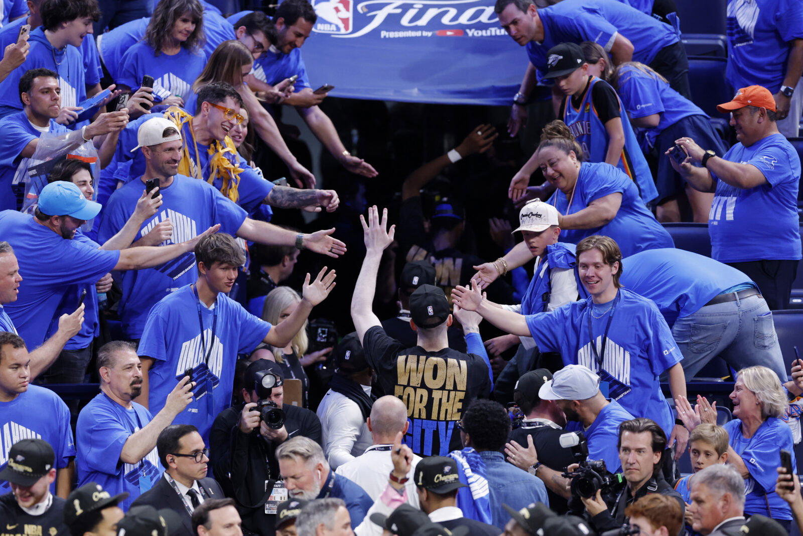 Jun 22, 2025; Oklahoma City, Oklahoma, USA; Oklahoma City Thunder forward Chet Holmgren (7) greets fans as he walks off tthe court after winning game seven of the 2025 NBA Finals against the Indiana Pacers at Paycom Center. Mandatory Credit: Alonzo Adams-Imagn Images