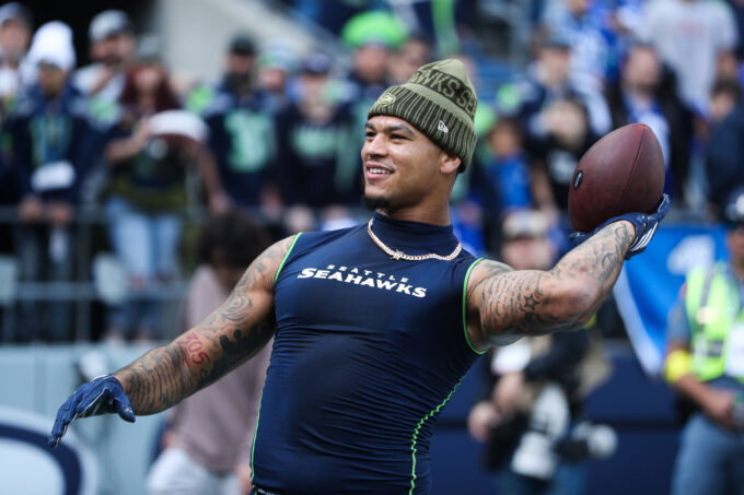 Nov 9, 2025; Seattle, Washington, USA; Seattle Seahawks safety Coby Bryant (8) warms up before the game against the Arizona Cardinals at Lumen Field. Mandatory Credit: Kevin Ng-Imagn Images
