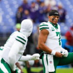 Nov 23, 2025; Baltimore, Maryland, USA; New York Jets quarterback Justin Fields (7) looks on before the game against the Baltimore Ravens at M&T Bank Stadium. Mandatory Credit: Peter Casey-Imagn Images