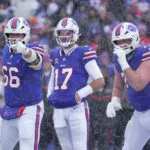 Buffalo Bills center Connor McGovern, Buffalo Bills quarterback Josh Allen and Buffalo Bills guard David Edwards get ready to line up during first half action at Highmark Stadium in Orchard Park on Dec. 7, 2025.