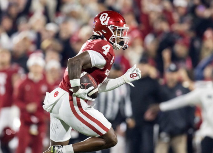 Dec 19, 2025; Norman, OK, USA; Oklahoma Sooners wide receiver Deion Burks (4) against the Alabama Crimson Tide during the CFP National Playoff First Round at Gaylord Family Oklahoma Memorial Stadium. Mandatory Credit: Mark J. Rebilas-Imagn Images
