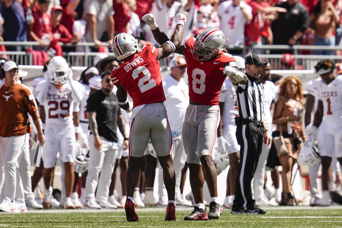 Ohio State Buckeyes safety Caleb Downs (2) and linebacker Arvell Reese (8) celebrate during the NCAA football game against the Texas Longhorns at Ohio Stadium on Aug. 30, 2025.