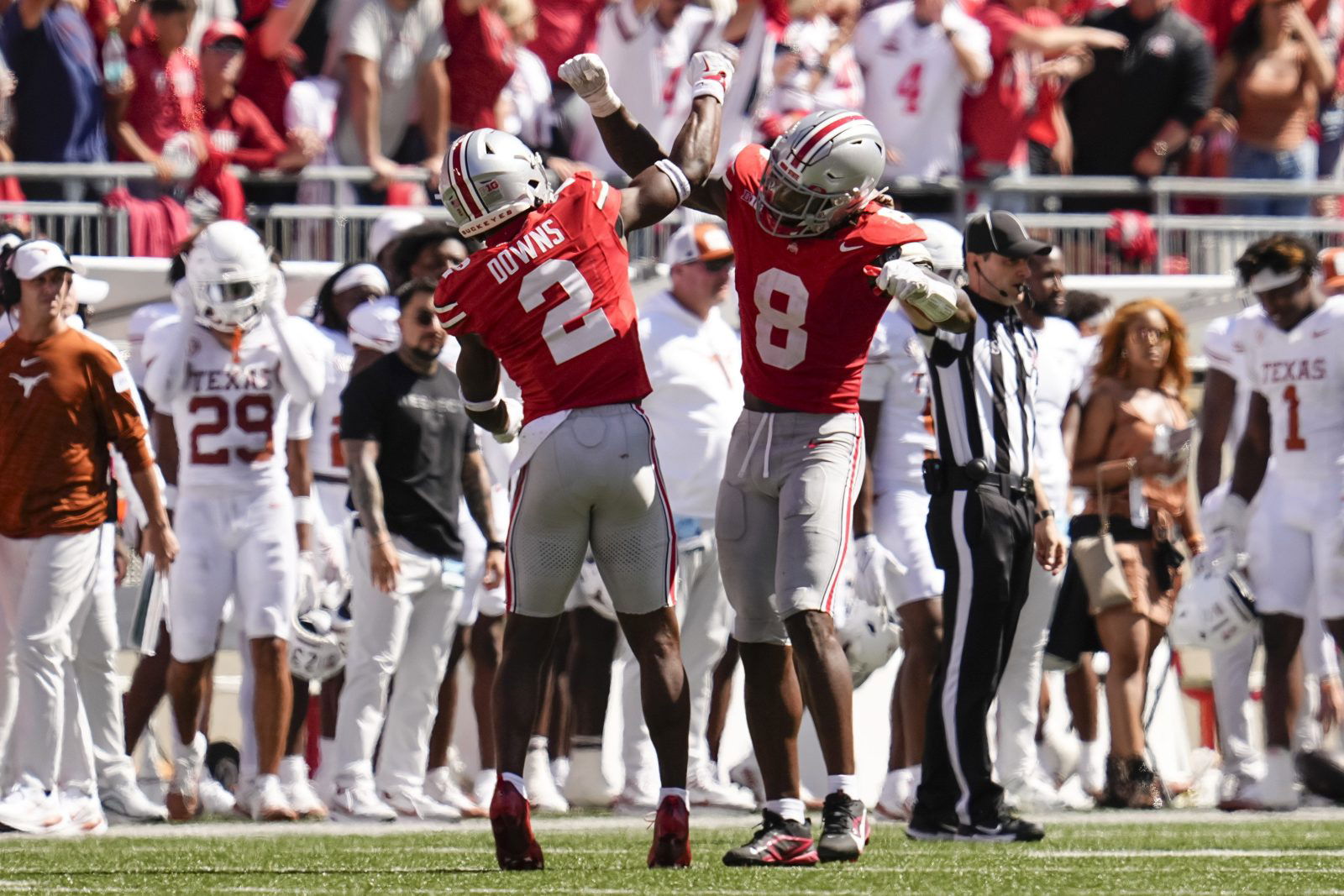 Ohio State Buckeyes safety Caleb Downs (2) and linebacker Arvell Reese (8) celebrate during the NCAA football game against the Texas Longhorns at Ohio Stadium on Aug. 30, 2025.
