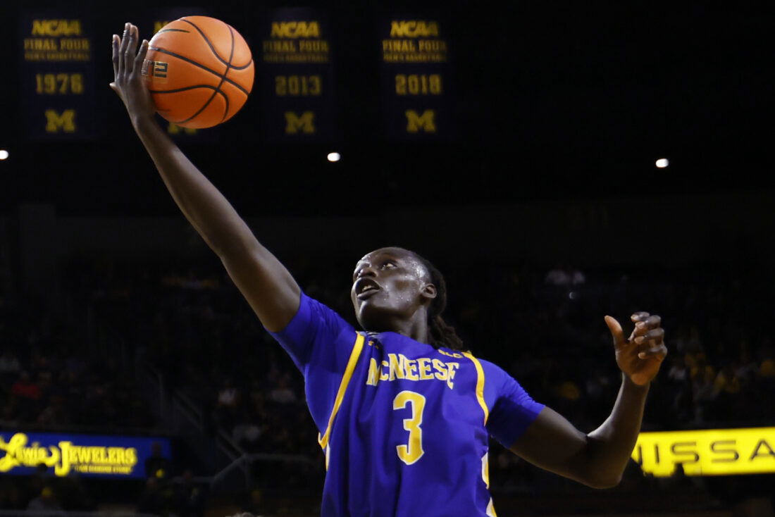 Dec 29, 2025; Ann Arbor, Michigan, USA; McNeese Cowboys guard Garwey Dual (3) shoots in the second half against the Michigan Wolverines at Crisler Center. Mandatory Credit: Rick Osentoski-Imagn Images