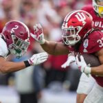 Indiana Hoosiers tight end Riley Nowakowski (37) rushes up the field against Alabama Crimson Tide defensive back Zabien Brown (2) on Thursday, Jan. 1, 2026, during the 112th annual Rose Bowl game in Pasadena. Indiana Hoosiers defeated Alabama Crimson Tide, 38-3.