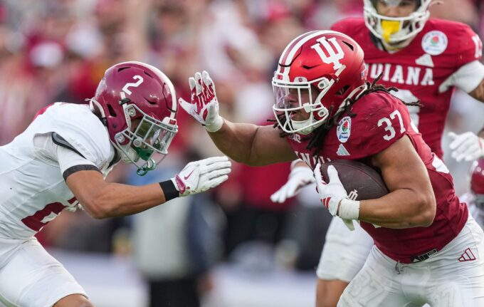 Indiana Hoosiers tight end Riley Nowakowski (37) rushes up the field against Alabama Crimson Tide defensive back Zabien Brown (2) on Thursday, Jan. 1, 2026, during the 112th annual Rose Bowl game in Pasadena. Indiana Hoosiers defeated Alabama Crimson Tide, 38-3.