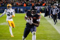 Jan 10, 2026; Chicago, IL, USA; Chicago Bears wide receiver DJ Moore (2) makes the eventual game winning touchdown catch against the Green Bay Packers during the second half of an NFC Wild Card Round game at Soldier Field. Mandatory Credit: David Banks-Imagn Images