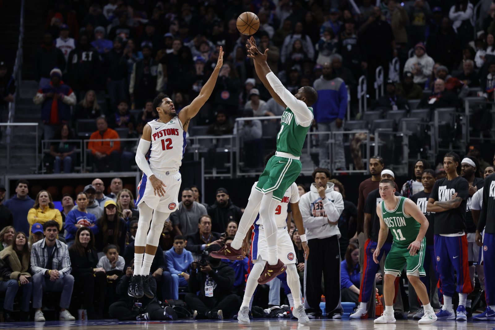 Jan 19, 2026; Detroit, Michigan, USA; Boston Celtics guard Jaylen Brown (7) shoots the ball against Detroit Pistons forward Tobias Harris (12) in the second half at Little Caesars Arena. Mandatory Credit: Rick Osentoski-Imagn Images