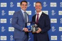 Jan 20, 2026; East Rutherford, NJ, USA; New York Giants general manager Joe Schoen and head coach John Harbaugh pose after the press conference announcing Harbaughs hiring at Quest Diagnostics Training Center.