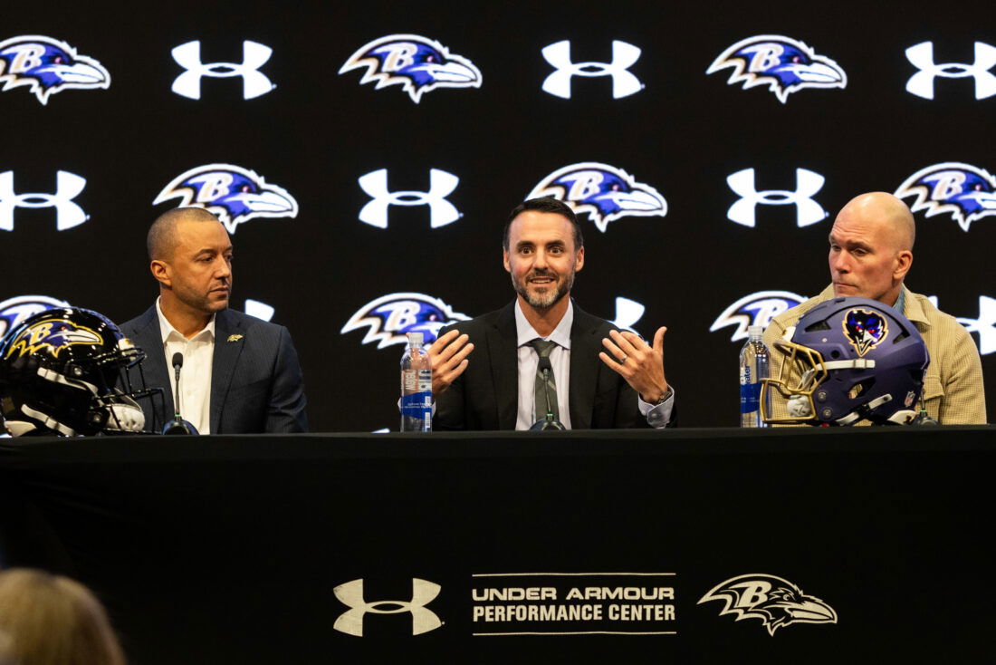 Jan 29, 2026; Owings Mills, MD, USA; Sashi Brown, Jesse Minter, and Eric DeCosta on the podium at the press conference introducing Jesse Minter at Under Armour Performance Center. Mandatory Credit: Lexi Thompson-Imagn Images