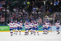 Feb 20, 2026; Milan, Italy; The United States celebrate after the game against Slovakia in a men's ice hockey semifinal during the Milano Cortina 2026 Olympic Winter Games at Milano Santagiulia Ice Hockey Arena. Mandatory Credit: James Lang-Imagn Images