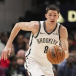 Feb 22, 2026; Atlanta, Georgia, USA; Brooklyn Nets guard Egor Demin (8) dribbles against the Atlanta Hawks during the first half at State Farm Arena. Mandatory Credit: Dale Zanine-Imagn Images
