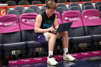 Feb 22, 2026; Washington, District of Columbia, USA; Charlotte Hornets guard Kon Knueppel (7) works on a computer before a game against the Washington Wizards at Capital One Arena. Mandatory Credit: Daniel Kucin Jr.-Imagn Images