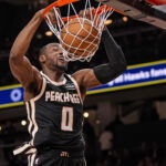 Feb 26, 2026; Atlanta, Georgia, USA; Atlanta Hawks forward Jonathan Kuminga (0) dunks against the Washington Wizards during the second half at State Farm Arena. Mandatory Credit: Dale Zanine-Imagn Images